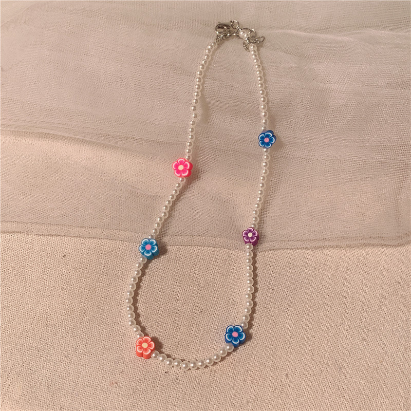 

Early spring cute flower pearl necklace niche design sense clavicle chain 2021 female spring simple neck chain