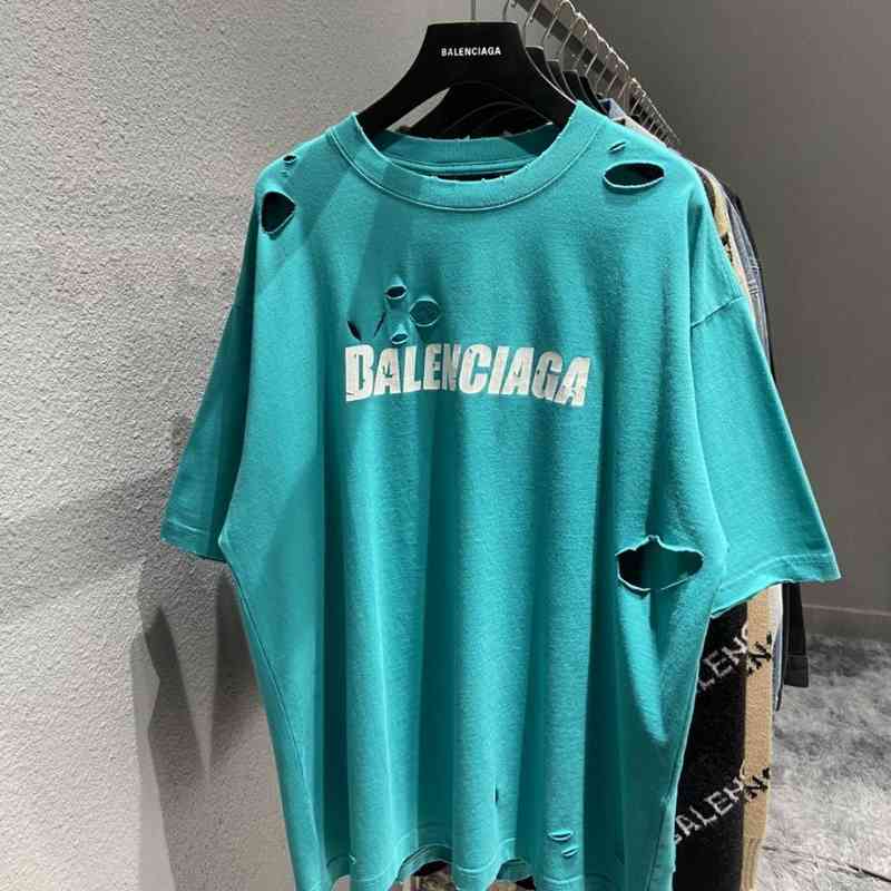 

balencaigas men t-shirts Original version of Paris B house broken hole cracked short sleeve T-shirt for men and women, White