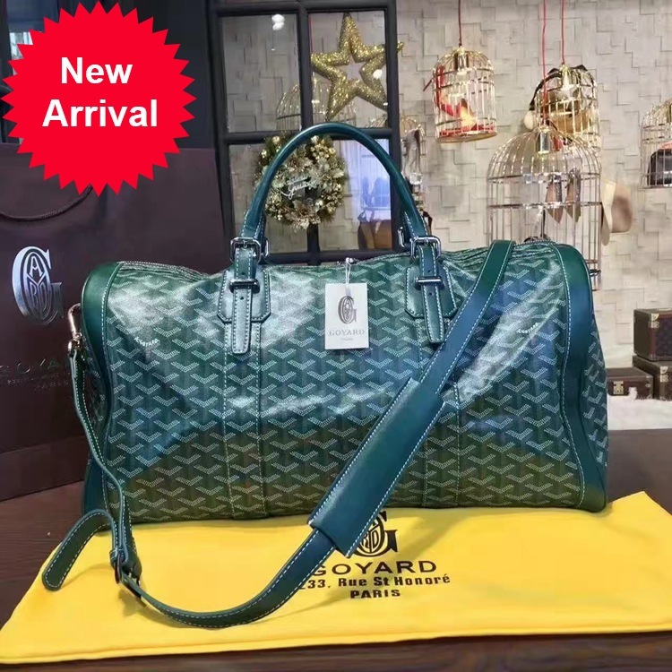 

G family fashion star's large capacity portable straddle men's and women's Goya leather travel bag