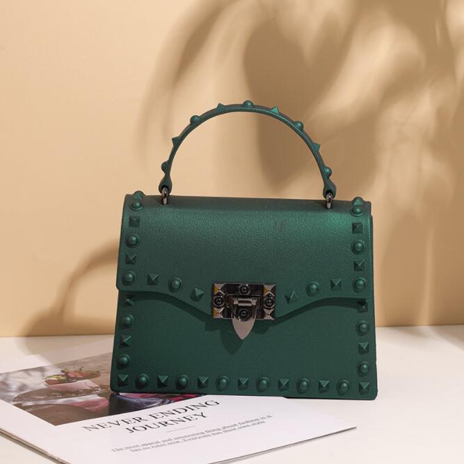 

Factory wholesale women bag matte mattes jelly bags Korean version of the fashion portable single shoulder handbags clamshell rivethandbag