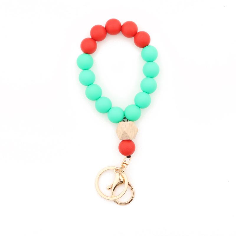 

Keychains Christmas Classic Elements Printing Red Green Silicone Beads Bracelets Key Rings Festival Gift