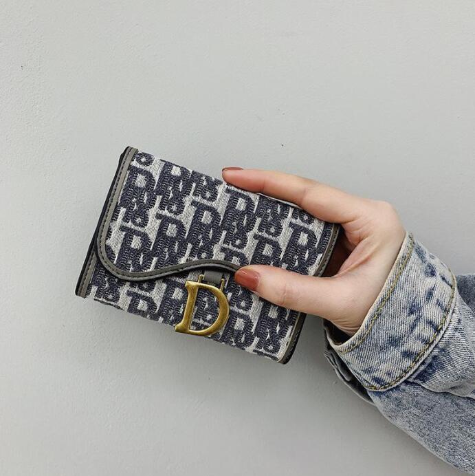 

2021 Luxury design short bag New Korean printed canvas zero wallet women's small folding buckle multi card cover, Grey