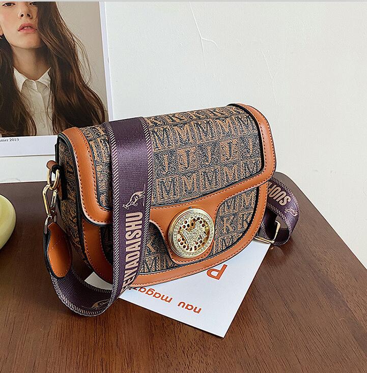 

Outlet women shoulders bags European fashions classic printed clutch bag comfortable wide shoulder strap fashion handbag street contrast leather backpack