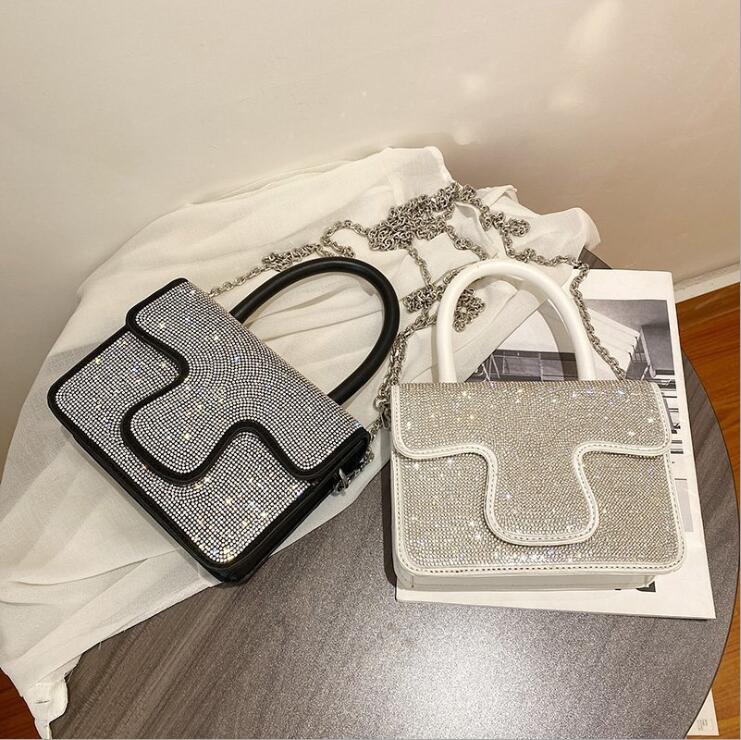 

Factory wholesale women handbag elegant atmosphere Diamonds chain bag simple Joker leather handbags street trend Beads womens messenger bags