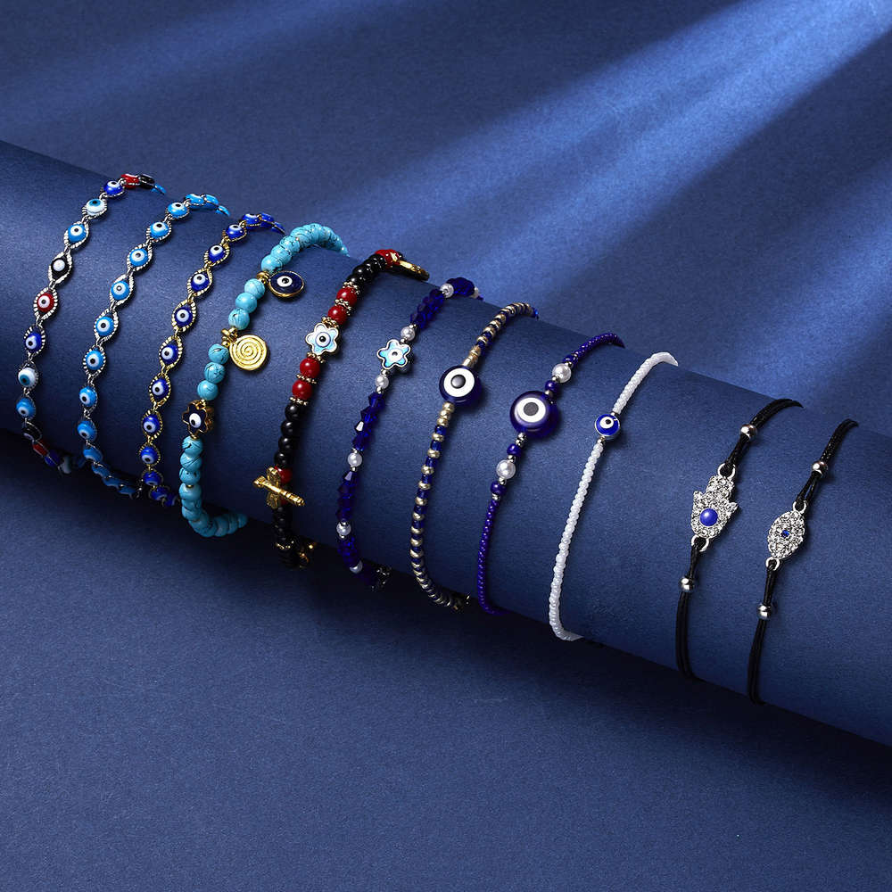 

Hand catenary Flower alloy Pearl Eye Bracelet with blue eyes, Black