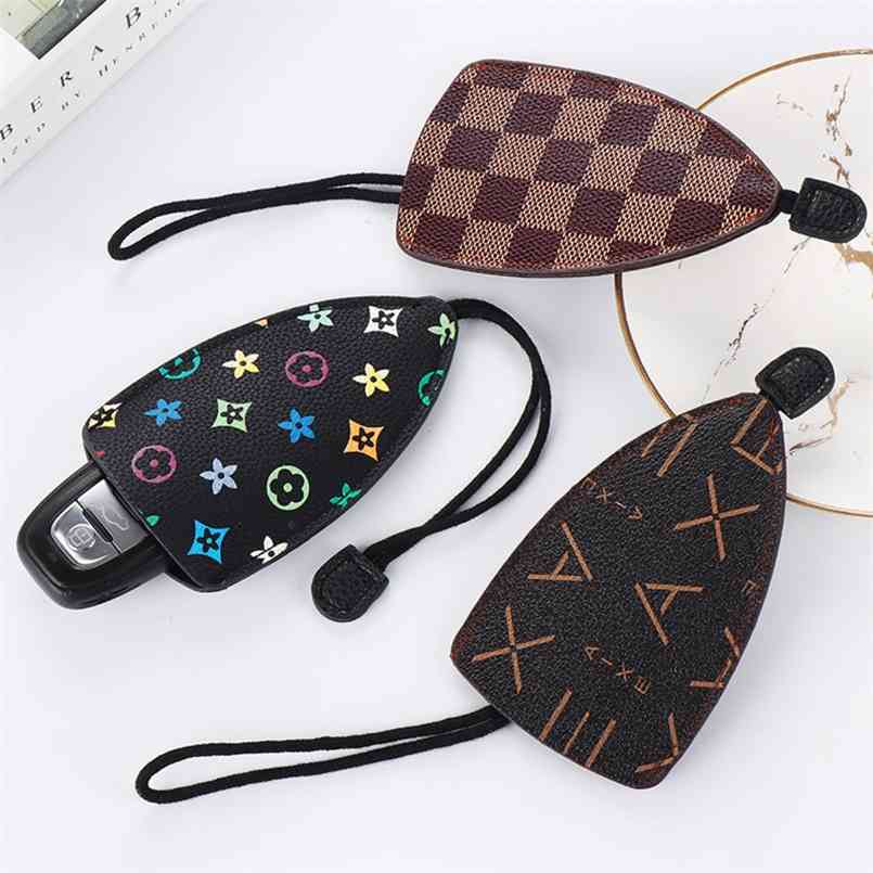 

Letters Printed Portable Handmade Leather Key Ring Buckle PU Car Key Chain Storage Leather Pulling Type Case Mini Keyring Bags Pandent G66QTTX, Black
