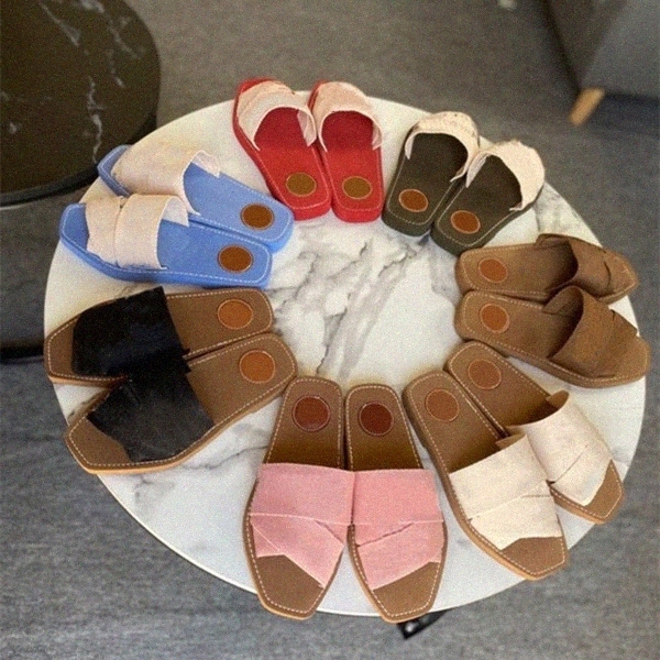 

2021 Newest Branded canvas Women Fflat Rome woody Slipper Deisgner Lady Lettering Fabric Outdoor Leather Sole Slide Cross braided tape Sandal