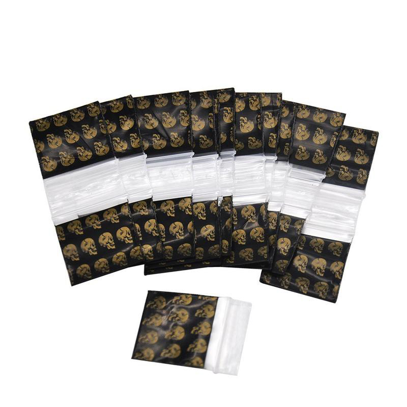 

Plastic Black skull sealed bag Tobaccos shredded storage bags small 30*34mm 22g weight tobacco pouch bags