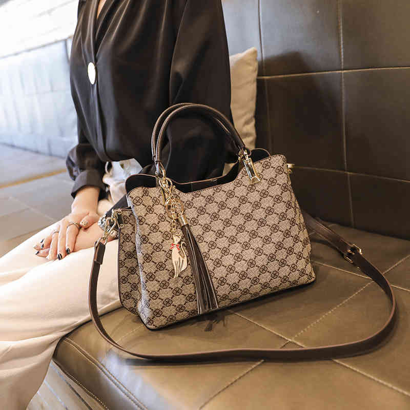 2022 Nouvelle mode grande capacité de grande capacité Sac à main imprimé sac à main célibataire Sac de messager féminin sacs cosmétiques pour dam