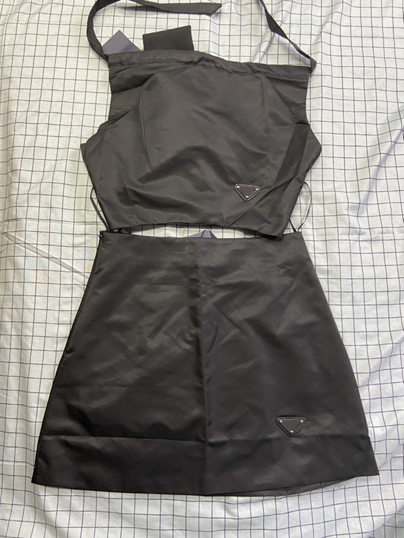 

Women's Two Piece Dress Set With Triangle Metal Vest Mini Short Skirt Set Streetwear Fashion Crop Top 22ss New Tracksuit, Extra shipping cost