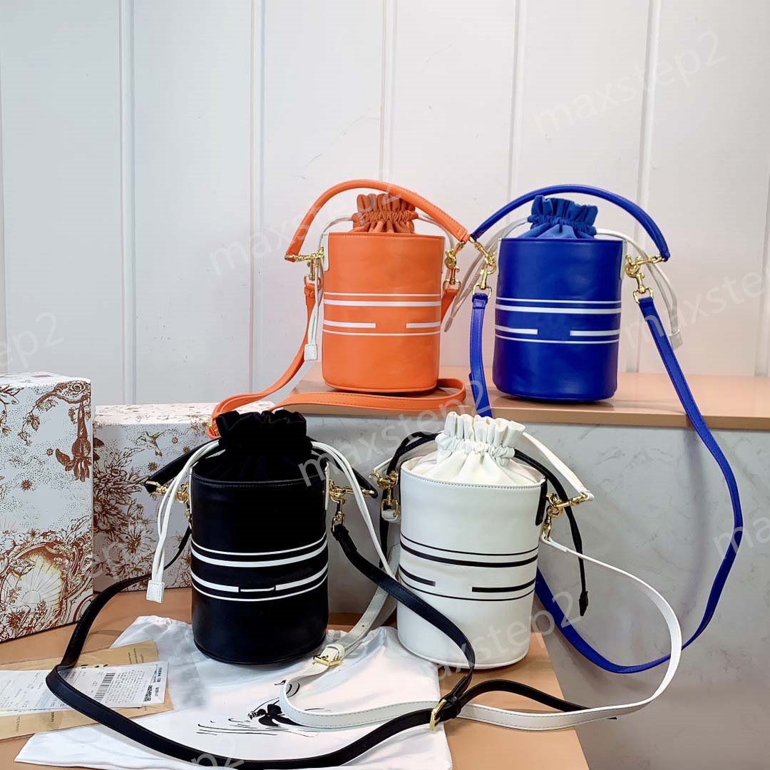 

Mini VIBE Bowling Bucket Bag Front Paris Signature Logo Star Motif Sculpted Rubber Bottom Luxurys Calfskin Cross body Bowlingbag