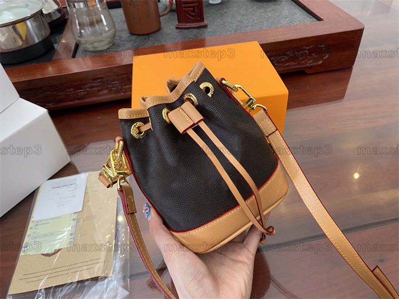 

2022 NANO Noé BB M81266 Designers Super Mini Bucket Bag Noe Neo Drawstring Handle Bag Brown Monograms Canvas Womens Luxurys Deisgner Handbag Ladies Cute CrossBody