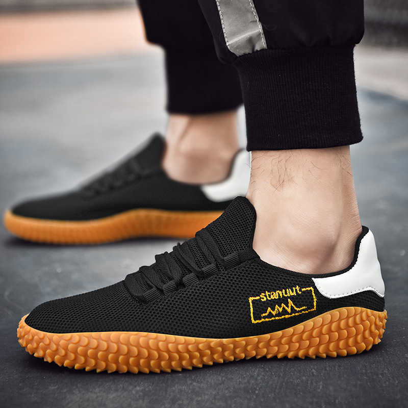 Couple de printemps et d'été haut de gamme volant des chaussures de sport tissées masculines et femmes décontractées grandes bisoustoureuses coré