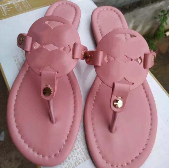 Sandales de créateurs pour femmes dames creusées motifs appartements basse talons pantoufles de mode luxe tories glisses en caoutchouc tongs d'ét