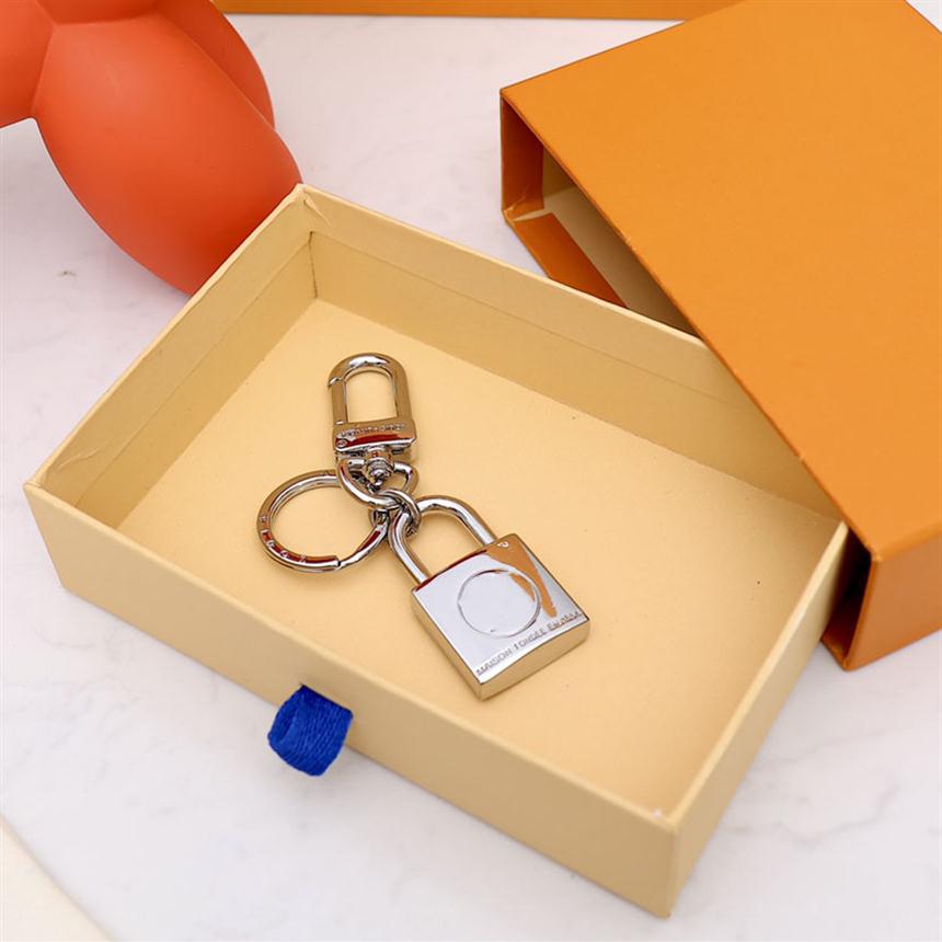 

Designer Alloy Keychain Keyring Fashion Purse Pendant Car Chain Charm Brown Flower Mini Bag Trinket Gifts Accessories jone-252416