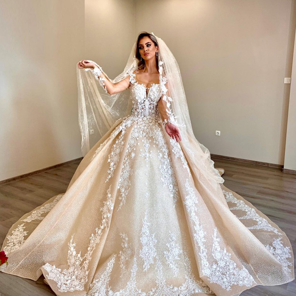 

Modest Princess Champagne Wedding Dresses Long Sleeves Sequin Lace Applqiue Sheer Neck Arabic Dubai Bridal Gowns Court Train