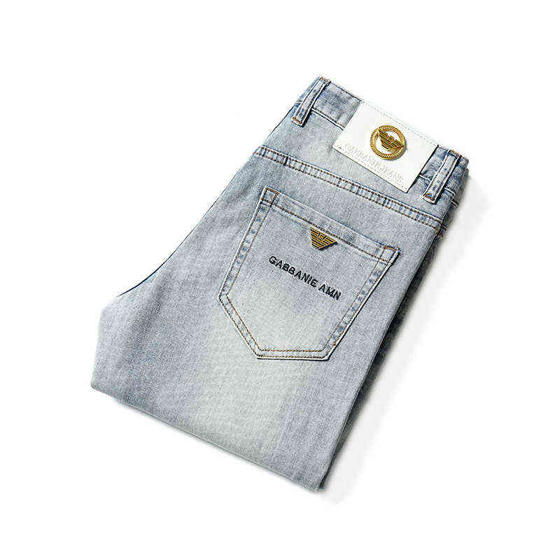 Bleu clair haut de gamme délavé blanc jean hommes printemps et été marque de mode mince élastique petit pied Tube droit