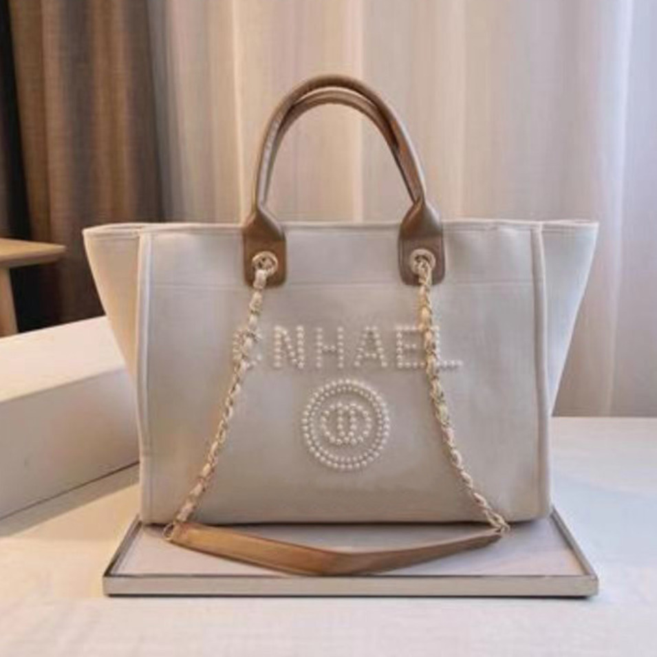 Marque de luxe de luxe sacs sacs de plage sac classique sac de soirée petite étiquette de perle bobby sac à dos mini-femelle pure Ladie speedry s