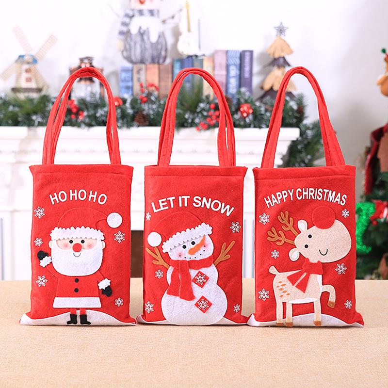 

Christmas Decorations 2022 Flannel Cartoon Children Gift Bag Portable Candy Apple Santa Claus Snowman Elk Ornament
