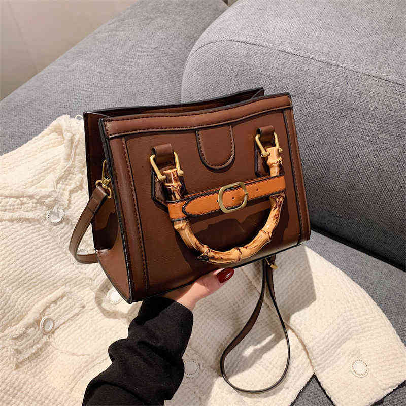 

Texture bag women's new hand style texture messenger single shoulder small square Purses, Black