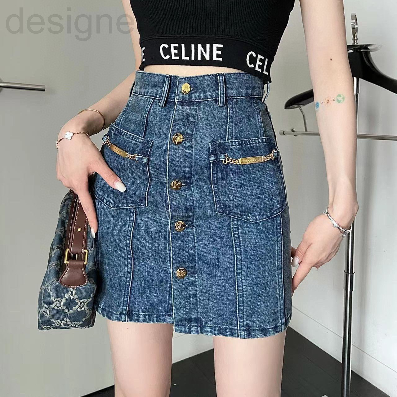 

Skirts designer Original standard ce22 spring and summer versatile slim breasted front pocket denim skirt Arc de Triomphe gold button A-shaped R0SW, 2# packing bag