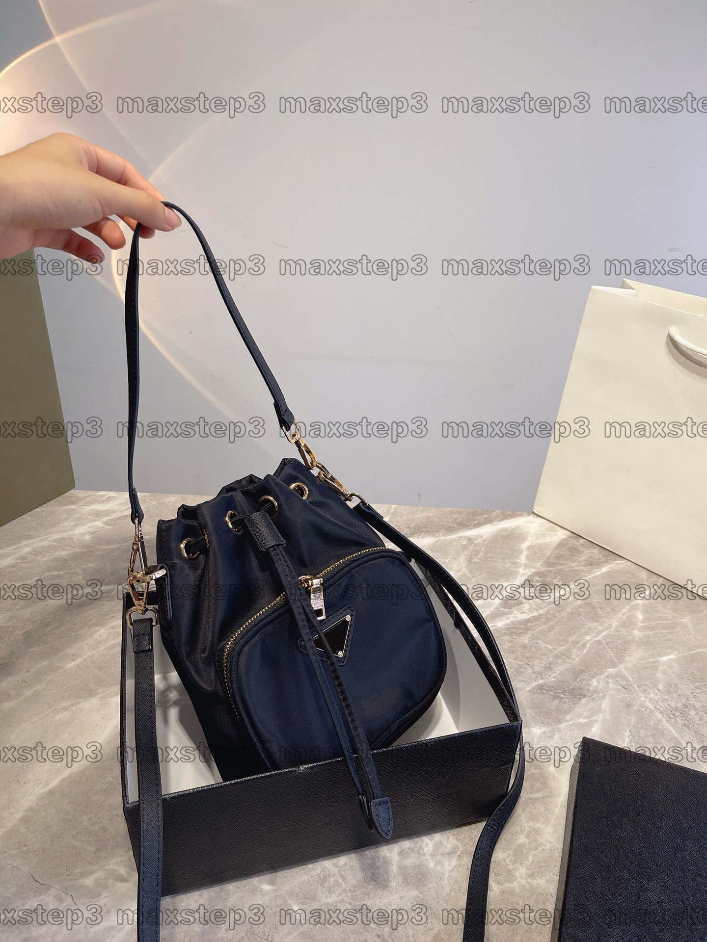 

Duet Re-nylon Bucket Shoulder Bag Tessuto Small Triangle Logo Drawstring Cross-body Designer Luxury Nylon Logo-print Fabric Handle Bag