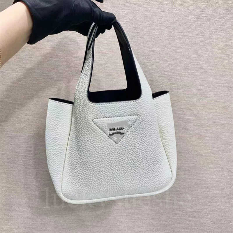 Leather Mini basket bag 2022 spring and summer new high-end versatile black-and-white foreign style portable bucket bag women