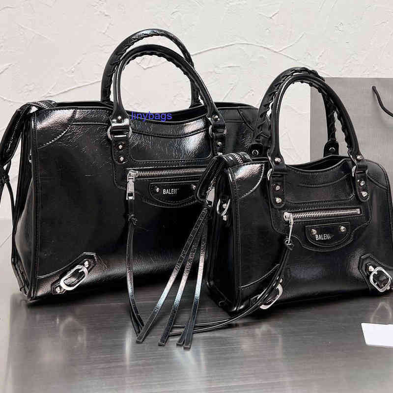 

designer bags balencaigass 2022 star's same motorcycle B lady's hand-held messenger is a must for travel. It's fashionable and versatile. 4EVD, White