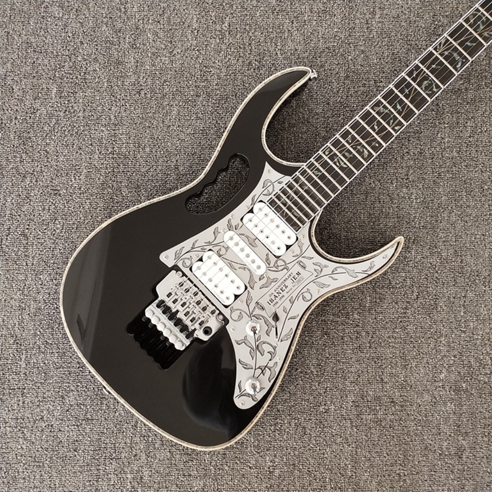 

Rare 10th Anniversary SteveVaiJem 7 Black Electric Guitar Aluminum Pickguard, Ebony Fingerboard, Real Abalone Body Binding, Vine Inlay, Floyd Rose Tremolo Bridge