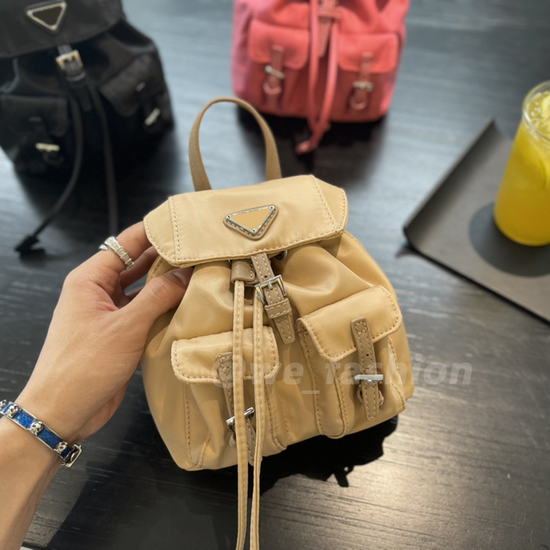 Femmes mini sacs de sac à dos sacs triangle sacs pour hommes small pack concepteurs nylon à sac à main en nylon pour femmes sac à main sac à main