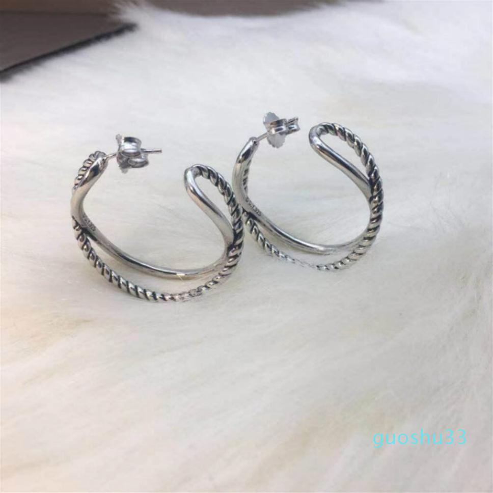 

American and European luxury customized earrings DY environmental protection copper plating genuine gold thread rotating 1975