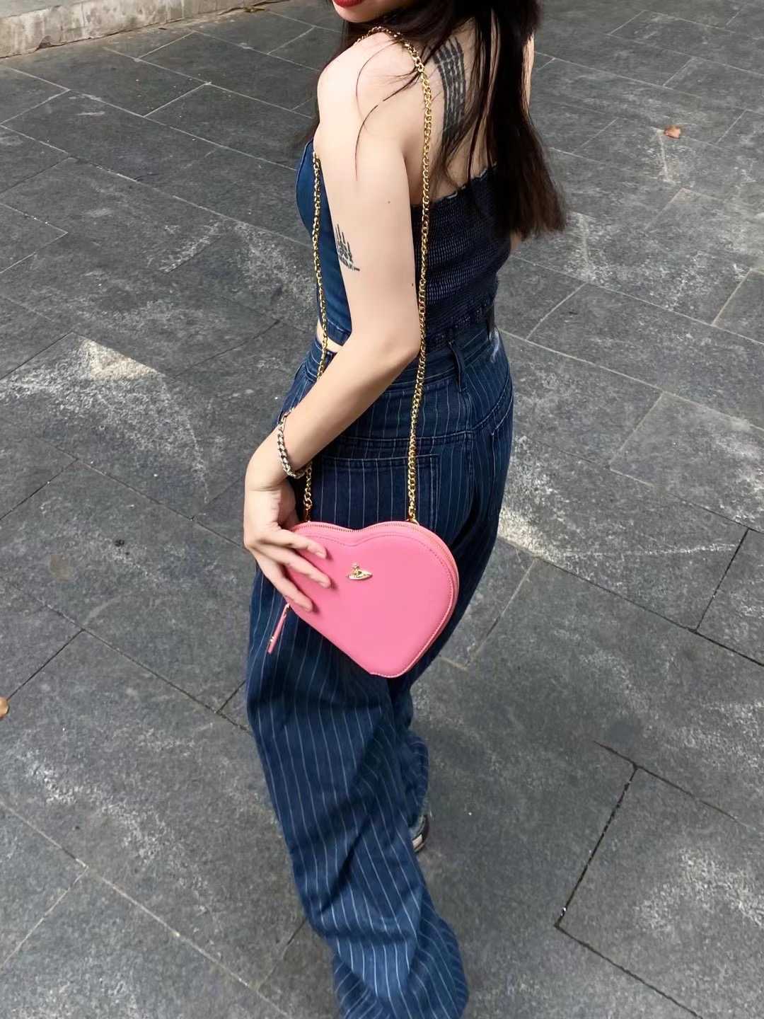 

Minority design of Empress Dowager bag female 2022 new Saturn love bag texture chain Single Shoulder Messenger peach heart bag ys, Black