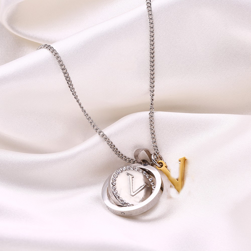 

Fashion Gold Rotatable Chain Necklace Bracelet for Mens Womens Luxury Designer Necklaces Jewelry Women Stainless Steel Diamond Gold Pendants Lovers