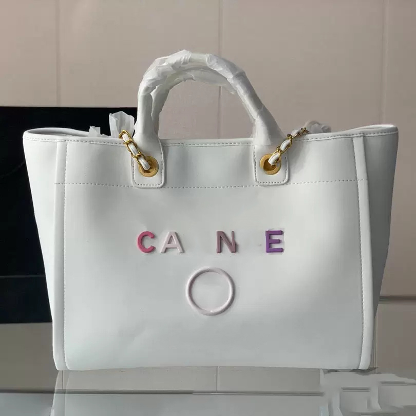 

22Ss Womens Shopping Bag Color Metal Letter Calfskin Handheld Classic Outdoor Beach Handbags Hardware Chain Luxury Designer Ladies French Shoulder Bag Sacoche L27, Extra freight