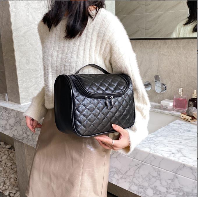 

Fashion Designer lady Travel bag Genuine Leather large capacity cosmetic bags, Black