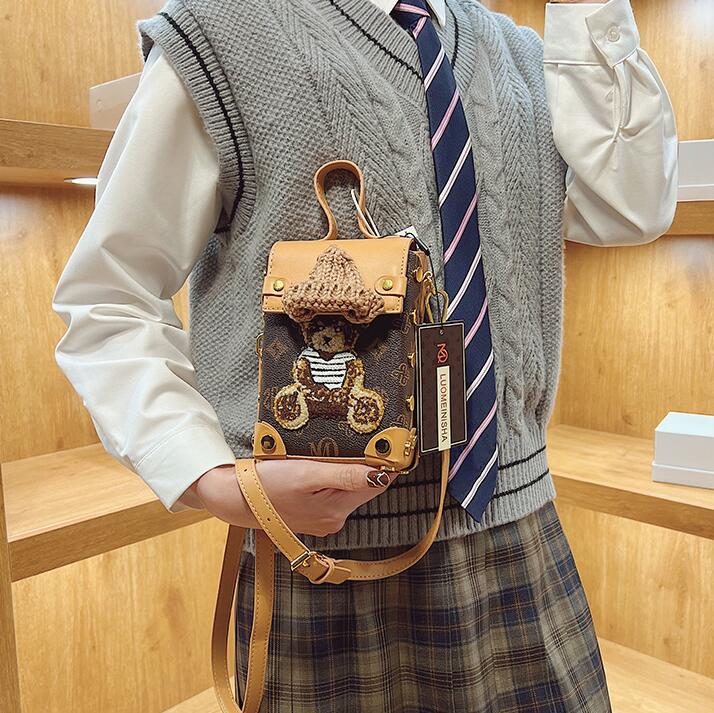 

Wholesale factory ladies leather shoulder bags sweet cute cartoon hard box bag street personality embroidered handbag European popular printed backpack, Coffee2-911