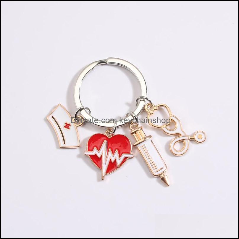 

Key Rings Jewelry Custom Doctor Keychain Medical Tool Chain Heartbeat Stethoscope Syringe Nurse Cap Keyring Gift Diy Han Dhbym