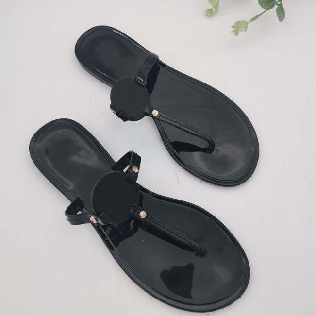 2022 Designer Sandales Femmes Motif évidé Appartements Pantoufles Tendance Luxe Tories Diapositives En Caoutchouc D'été Tongs En Plein Air Plage