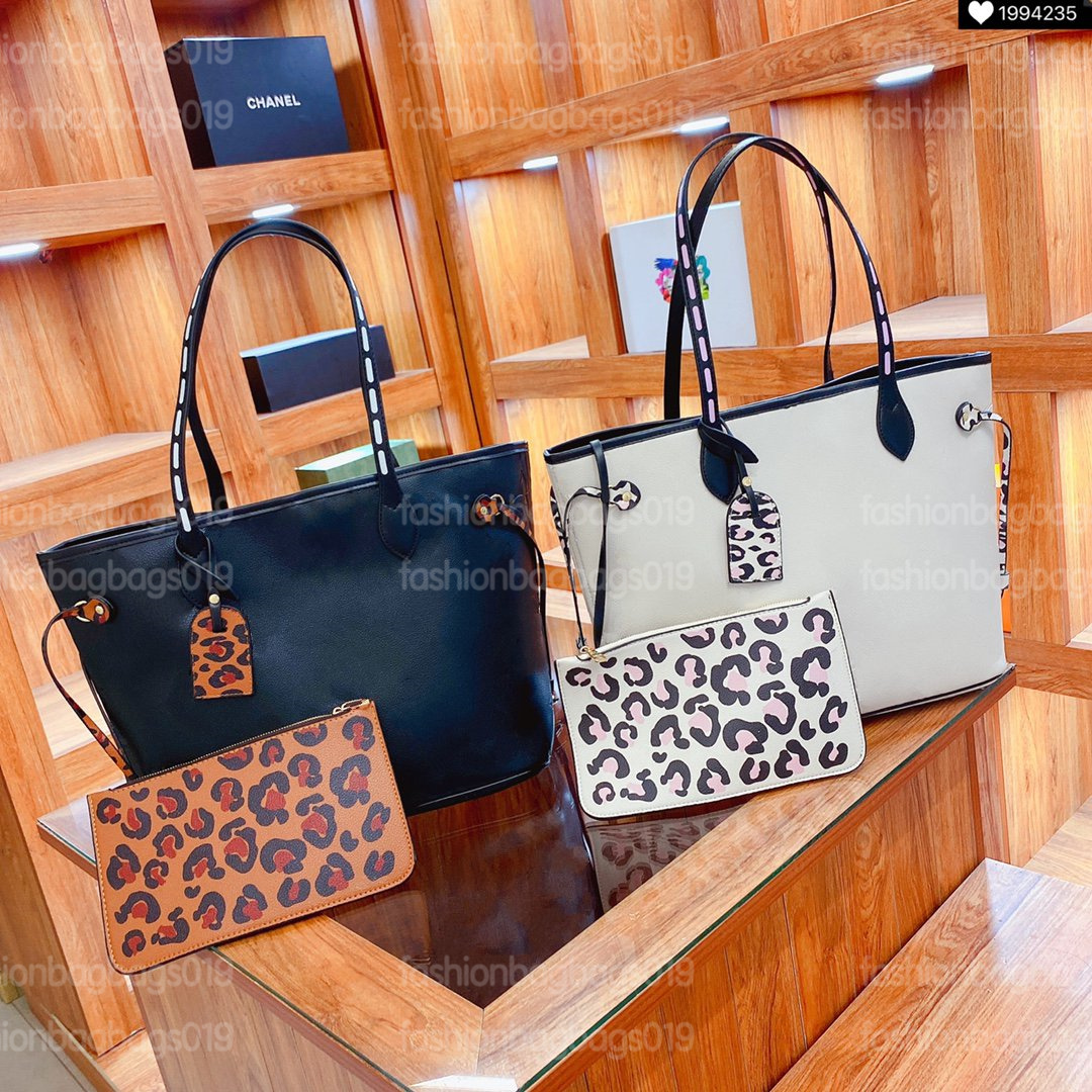 

Never MM Full Tote Shopping Bag Wild At Heart Series White Embossed Monograms Canvas with Leopard Tag Zip Clutch Pouch Luxurys Handbag