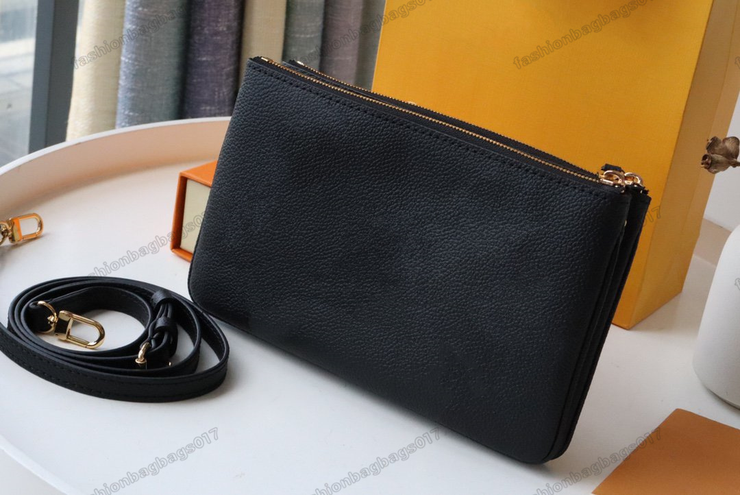 

DOUBLE ZIP POCHETTE M80787 Stylish City Bag Bicolour Monograms Empreinte Embossed Supple Grained Leather Luxurys Womens Cross Body