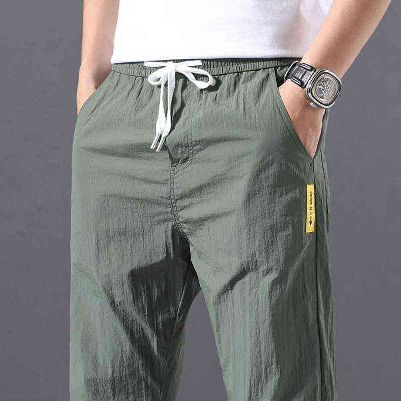 

2021 Summer Men Pants Sports Outdoor Casual Trousers Solid Color Elastic Waist Lightweight Comfortab Ma Long Pants Plus Size H220715, Packing bag