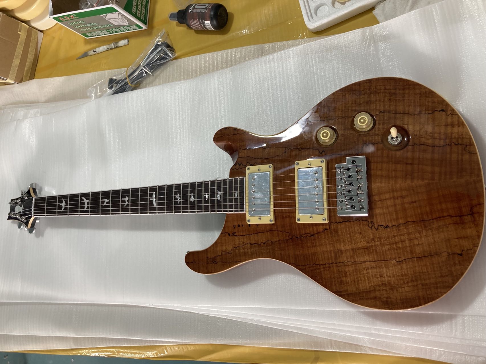 

Brown PRS Electric Guitar Neck Through Body A Flame Maple Top Fingerboard Ebony Frets 24 Inlays Birds Gold Hardware