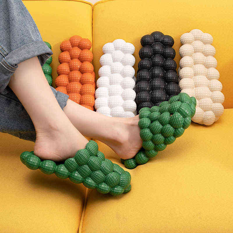 Sandales de bulles de la personnalité de la mode féminine et pantoufles de massage de massage à domicile Pantonnages au sol pour hommes