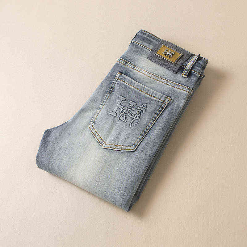 

Spring 2022 / Summer Thin Light Blue Jeans Men's Slim Fit Small Feet Korean Version Elastic Pants High-end Fashion Brand