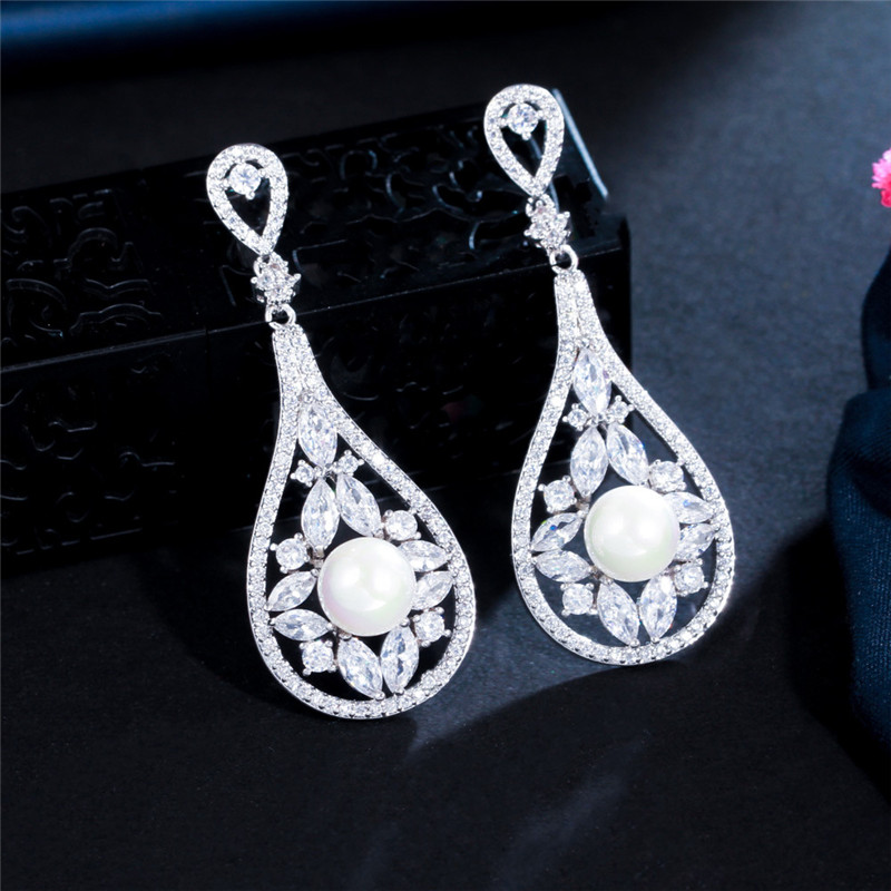 Luxury Perle Perle enrôle des boucles d'oreilles créatrices pour femme fête argentée blanche zirconi en diamant en diamant oreille d'oreille sud-