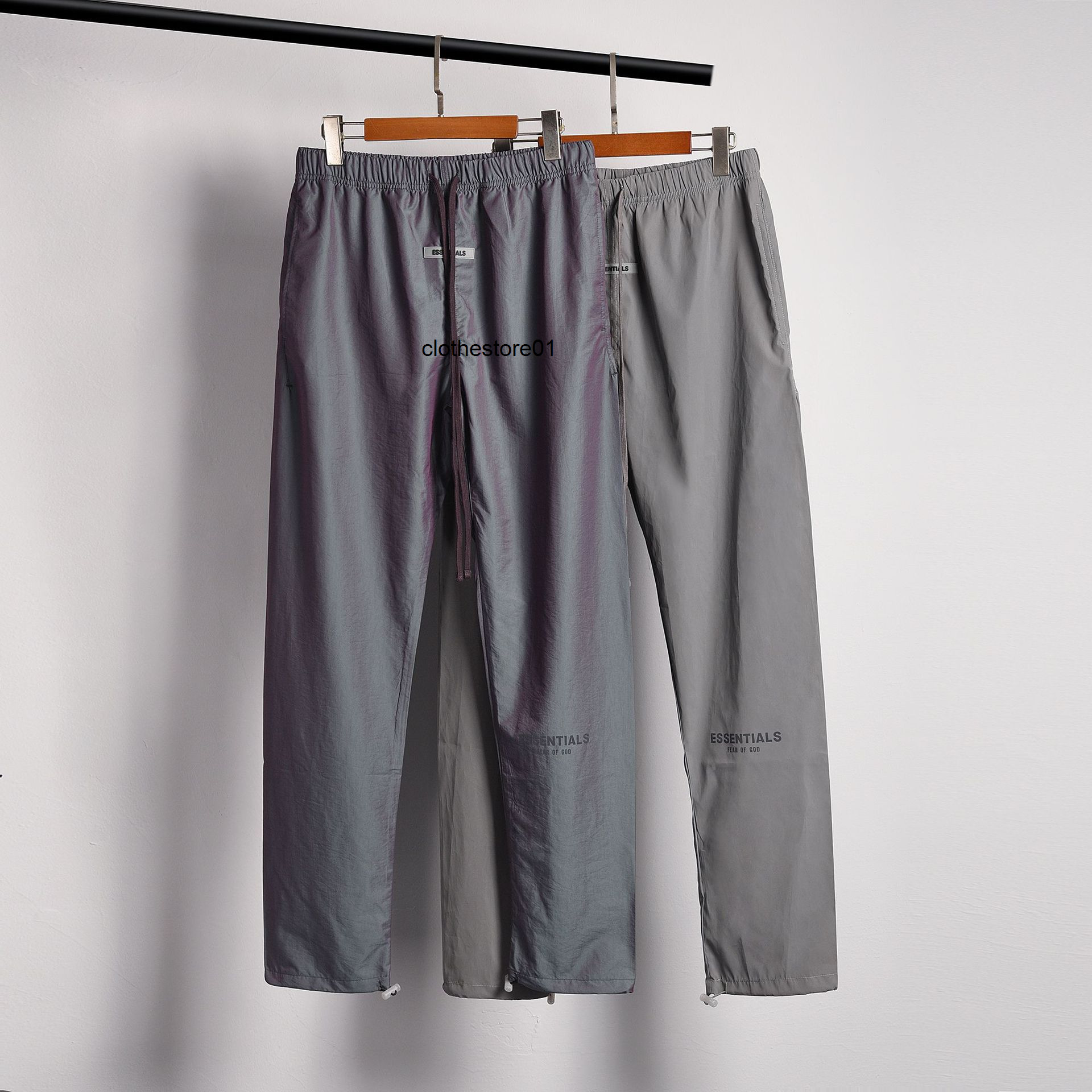 

20fw hip hop essentialss high street nylon laser color reflective men' and women' drawstring pants, Colorful