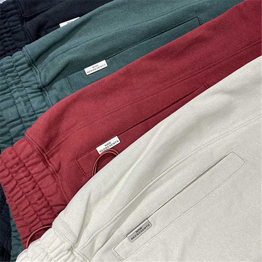 

Embroidery in white men high quality women represent man shorts long pockets with drawstring, Beige