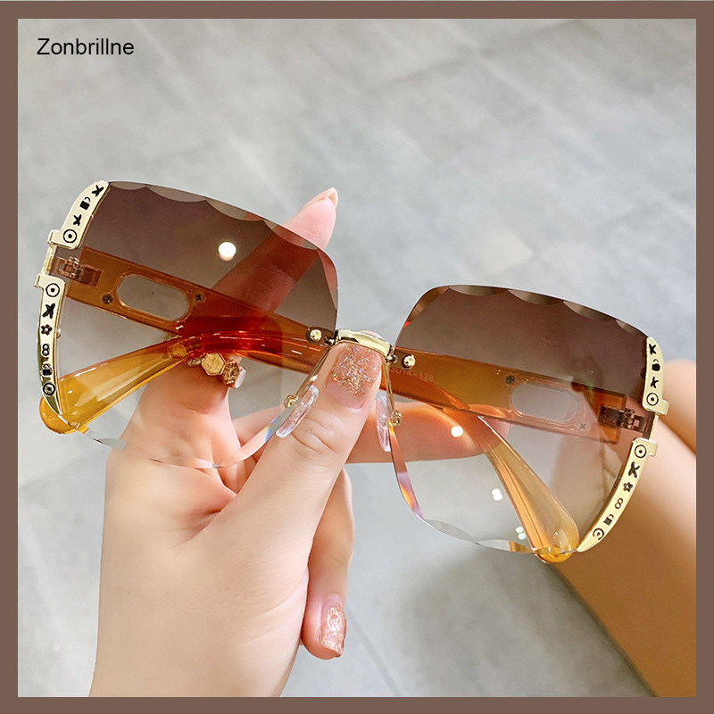 

Zonbrillne fashion cut edge sunglasses female 2022 rimless square gradually changing UV400 personality network red polarized glasses