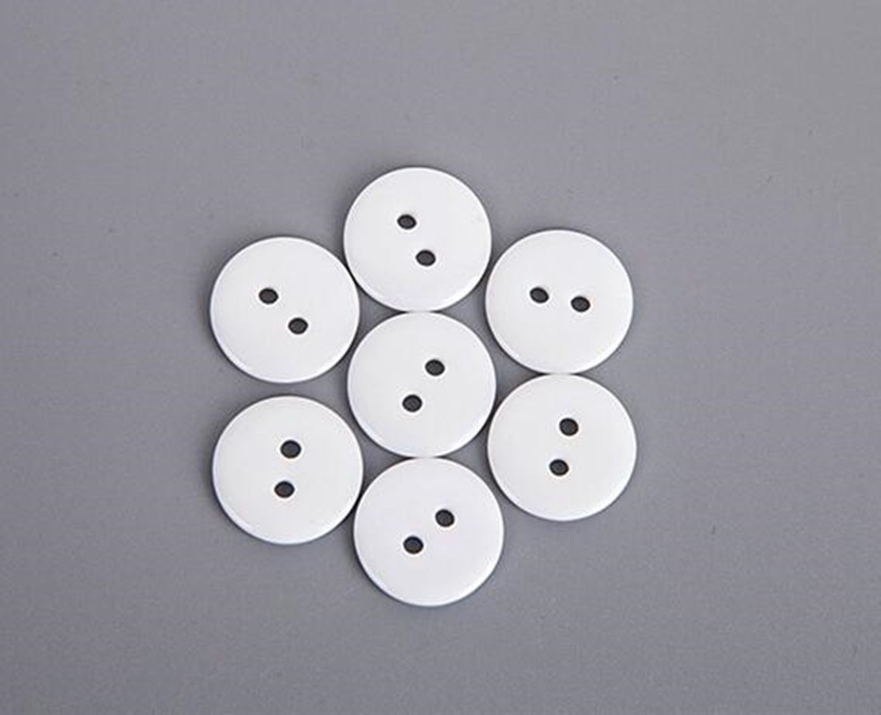 

04 Sewing machine button