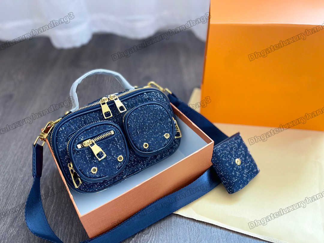 

Versatility Utility Crossbody Shoulder Bags Navy Denim Canvas Wide Textile Strap Multiple Zipped Pockets Sliding coin purse Luxurys